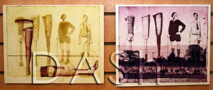 The photograph shows two prints hung on a wooden wall.  The first image on the left is landscape format and shows various types of artificial legs, in the image are a man and a woman modelling the artificial legs.  The image has been printed in yellow and overprinted in brown ther are two further artificial legs, on of the legs is prostrate.  In the right hand image, also in landscape format, the smae print is used in the background but the colour is deep pink, the image has been overprinted with a landcspe imae of trees.  Both of the prints were made by David Burns for the Barriers project.  Photograph by Paula Dower copyright DASh.